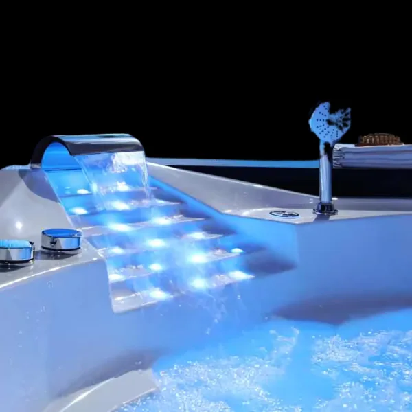 Close-up of waterfall water inlet and colorful lights on EmeraldSwell Hydro Jacuzzi