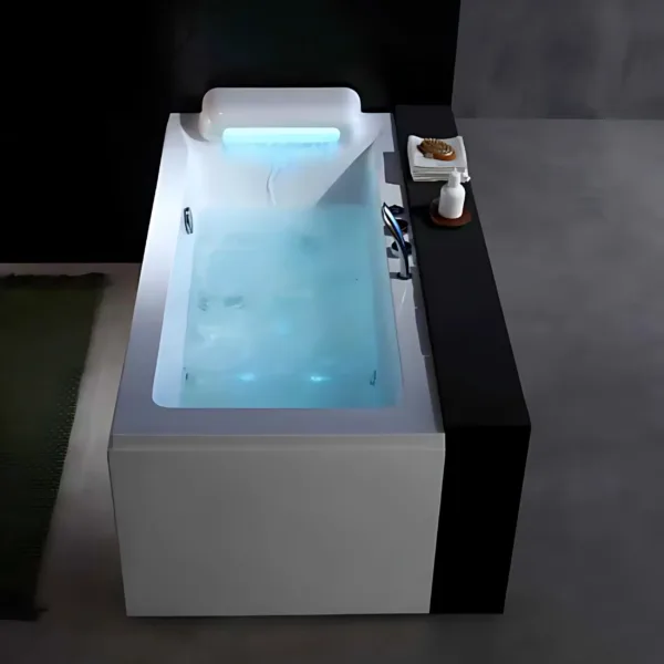 User adjusting water temperature with control switch on FlowWave Hydro Bathtub VV-L239”